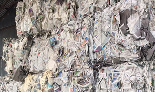 Over Issued Newspaper Baled